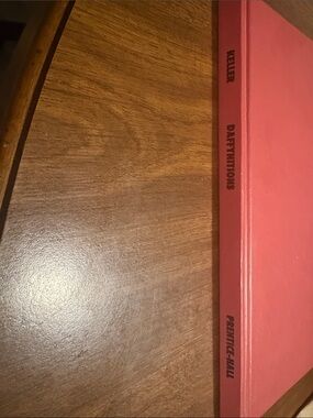 Red Hardcover Book by Keller